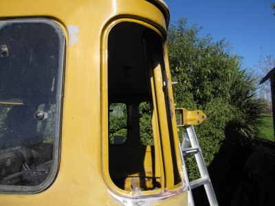 close up of the window seam where we opened it to rivet plate inside for seatbelt anchor point.