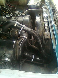 where the hot charged intercooler pipe and the cool retern intercooler pipe go to the front mount
