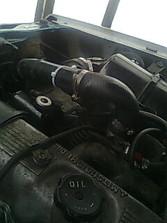 the cool intercooler pipe going into the intake manifold.