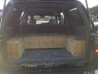 cargo barrier fitted with rod holders on other side