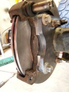 Caliper cradle