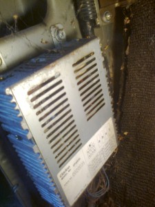 Hey look, a 24-12v reducer, which has no grounding wire it was (obviously) running the radio but is supposed to also run lights and clock. neither working. And my multimeter skills ran out, but it seems the harness in isn't getting the volts in needs.
