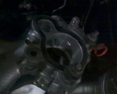 old throttle with butterfly holes blocked