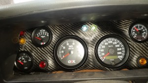 Yes warning light is close.only for handbrake. Can be seen from drivers seat easy though