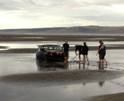 This is after half hour of winching and digging. Got him high enough to work on the engine.